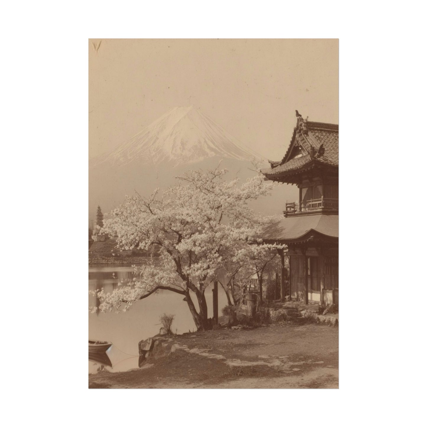 Vintage-style photograph of a traditional Japanese building with cherry blossoms and Mount Fuji in the background.